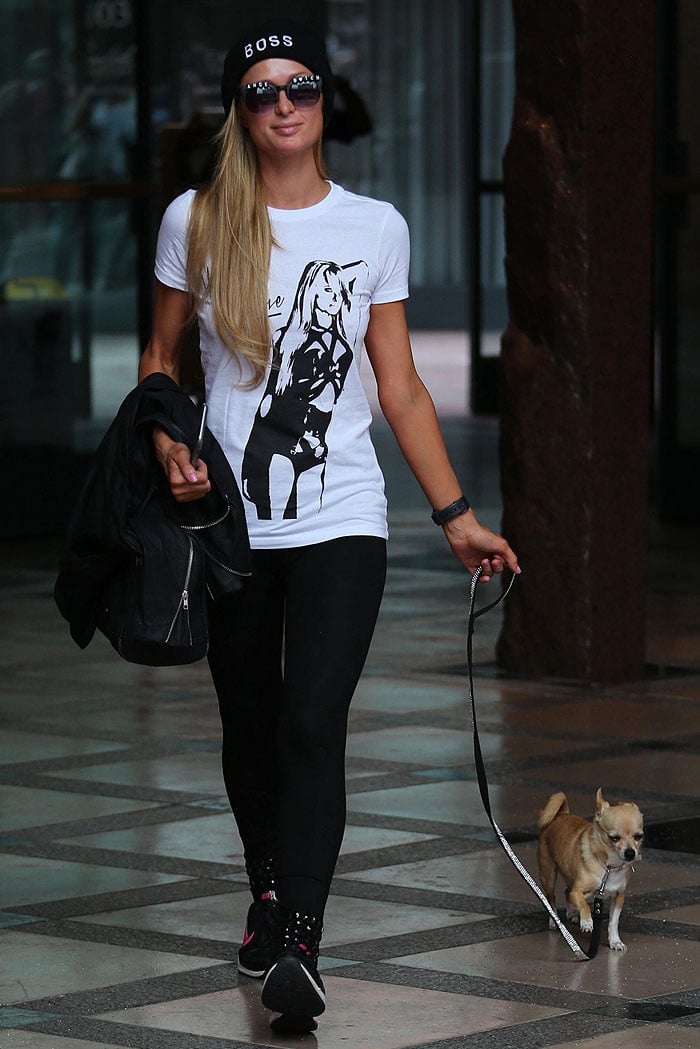 Paris Hilton greeting the paparazzi with her Chihuahua, Peter Pan