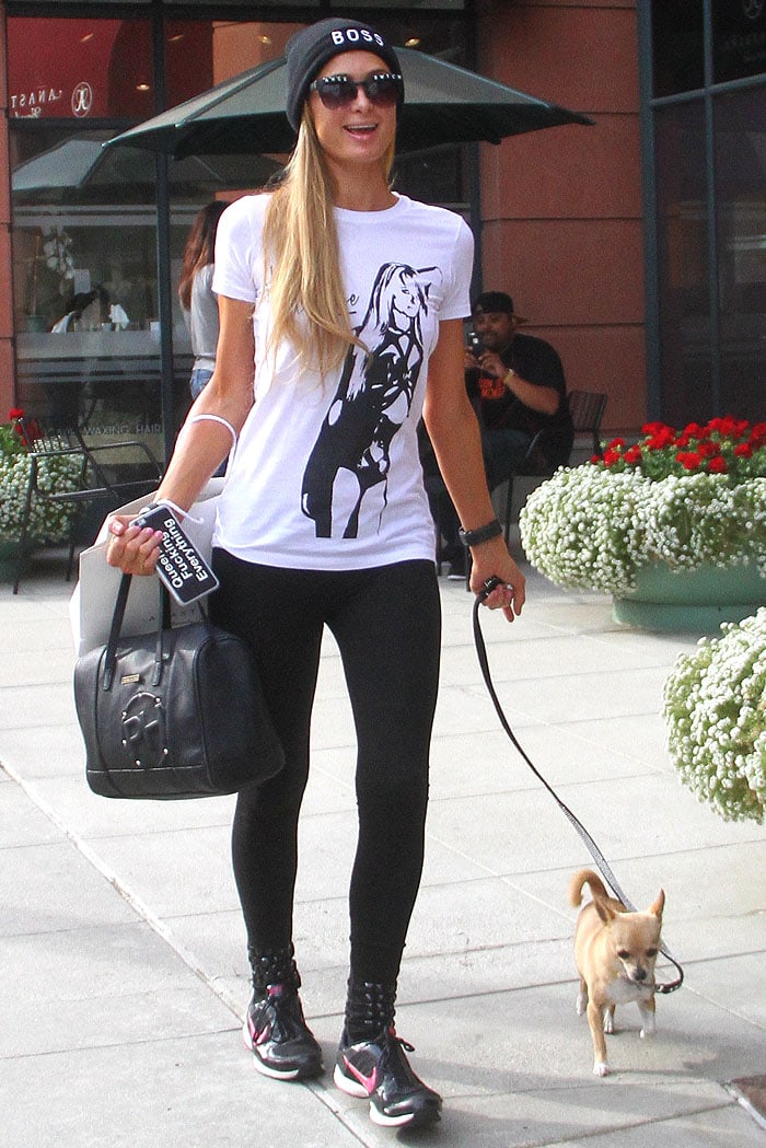 Paris Hilton with her dog, Peter Pan, leaving the Anastasia Beverly Hills Salon