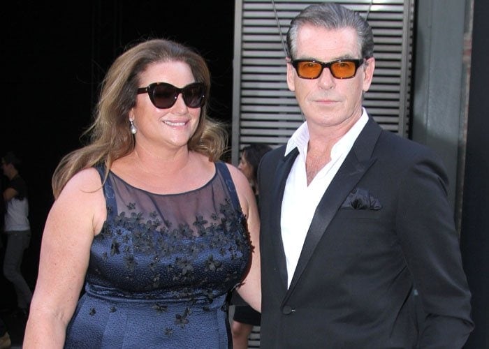 Salma Hayek's co-star Pierce Brosnan also attended the Saint Laurent show with his wife
