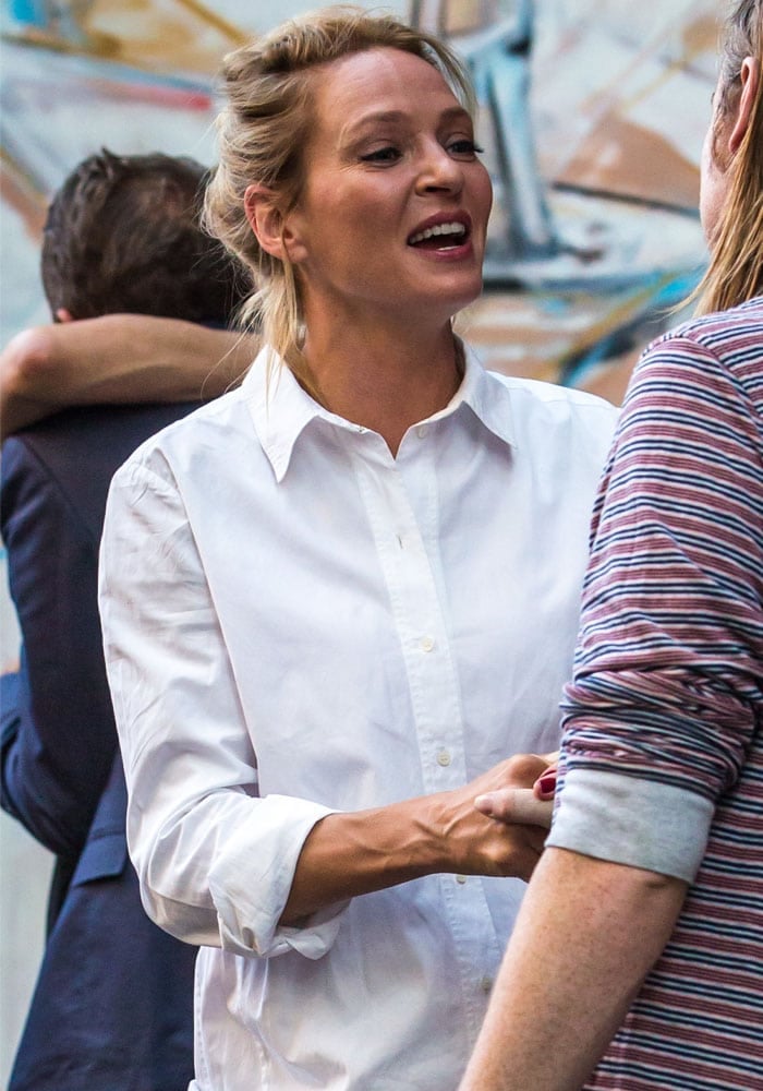 Uma Thurman laughs on set of her new movie "The Brits are Coming" — her latest project with Tim Roth — in New York on July 22, 2015