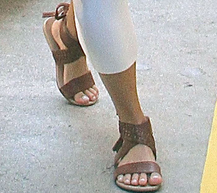 Vanessa Hudgens shows off the detailing on her Koolaburra "Alexa" sandals