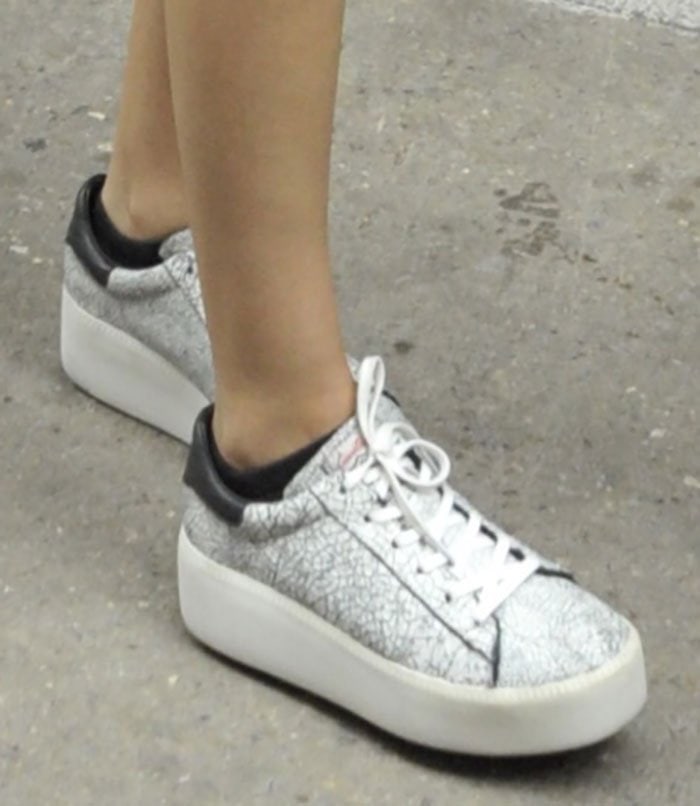 Victoria Justice wears platform sneakers by Ash