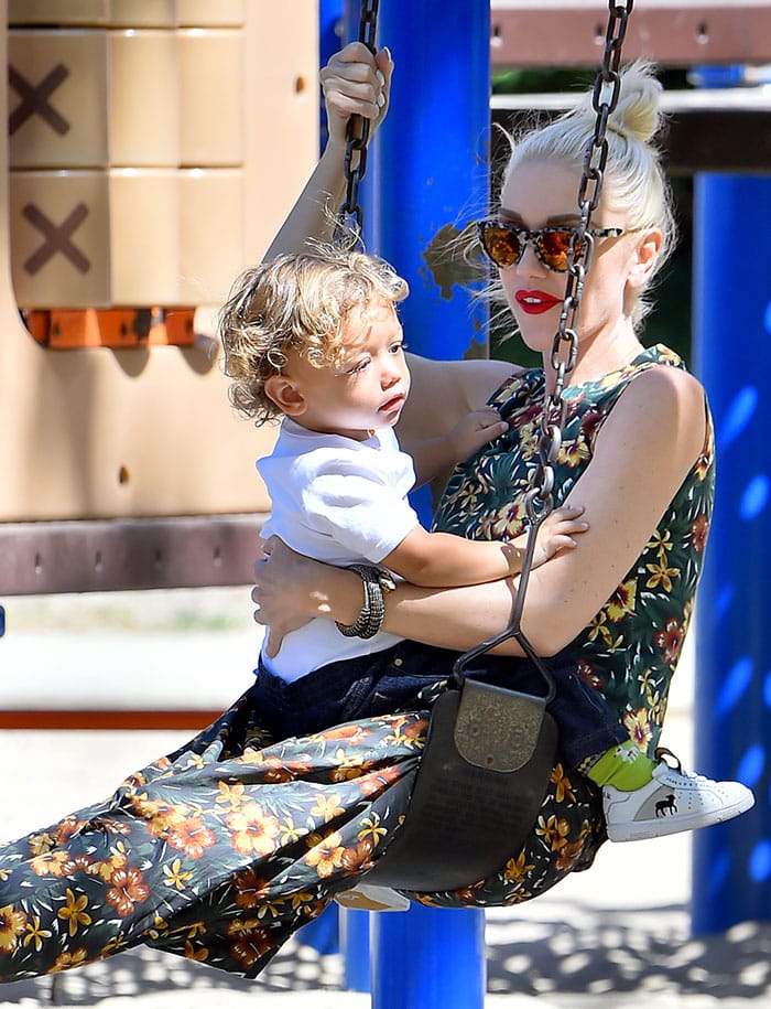 Gwen Stefani swings at the park with her youngest son, Apollo