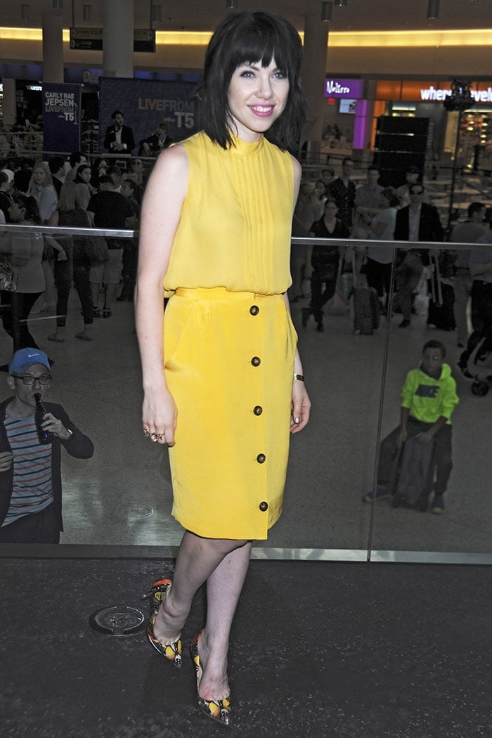 Carly Rae Jepsen paired a high-neck sleeveless top with a knee-length skirt