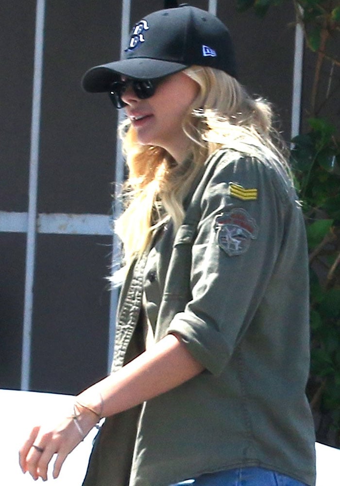 Chloë Grace Moretz rocks a patched button-down shirt