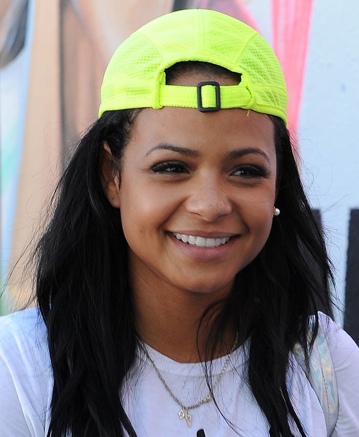 Christina Milian is all smiles as she runs errands