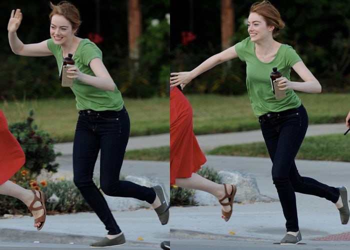 Emma Stone styled her green shirt with jeans and TOMS