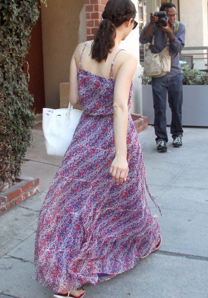 Emmy Rossum's maxi dress floats around her feet as the actress takes a stroll through Beverly Hills