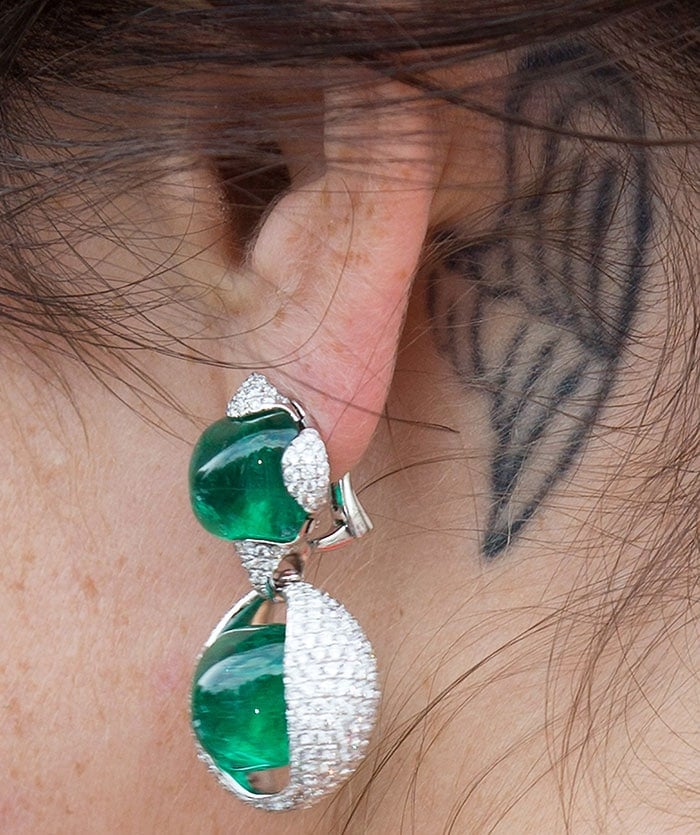 Gemma Arterton's angel wing tattoo and emerald drop earrings