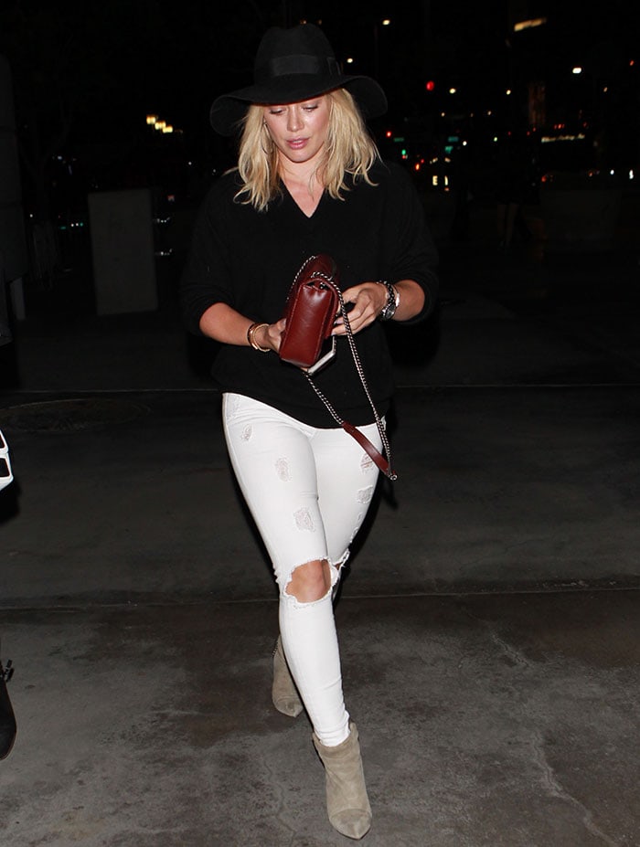 Hilary Duff arrives at the Staples Center for Taylor Swift's The 1989 World Tour