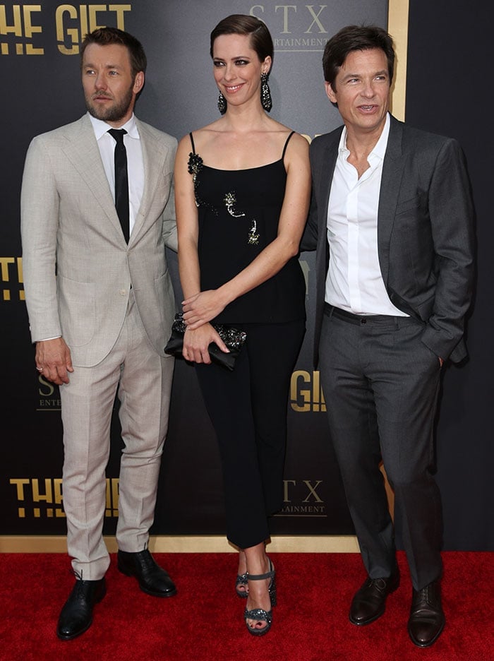 Rebecca Hall poses on the red carpet with co-stars Jason Bateman and Joel Edgerton at the premiere of 'The Gift'