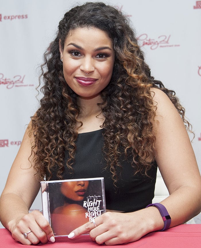 Jordin Sparks' long curly tresses were down and pinned back on one side