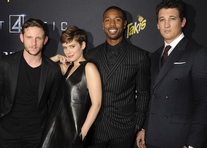 Jamie Bell, Kate Mara, Michael B. Jordan, and Miles Teller pose for a photo on the red carpet at the Fantastic Four premiere