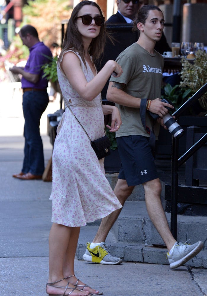 Keira Knightley ignores the paparazzi as she pauses on a New York sidewalk