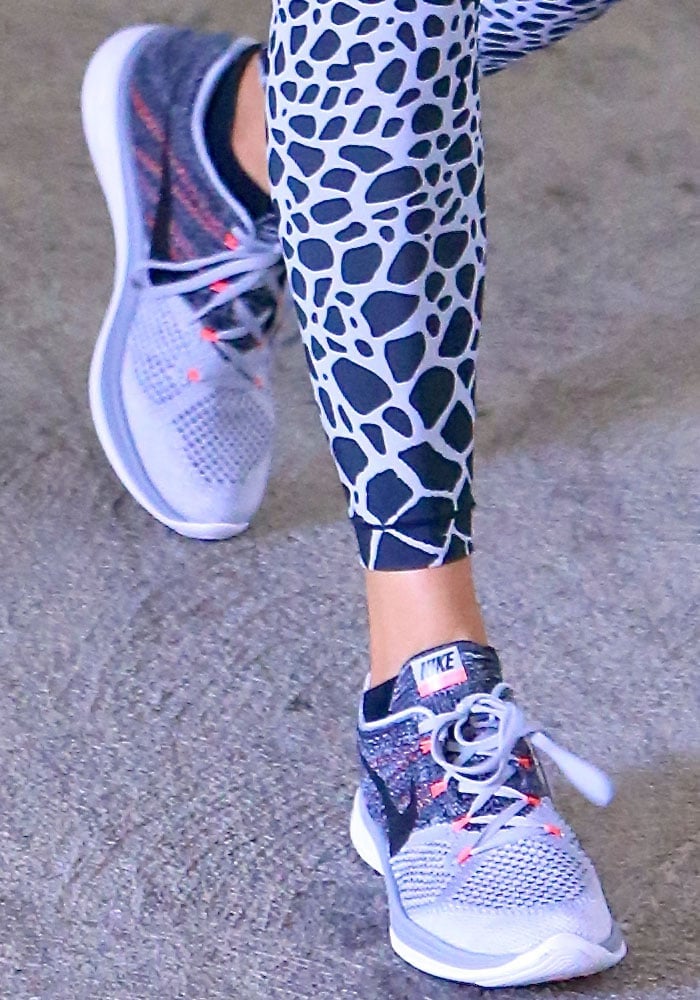 Khloé Kardashian shows off the detailing on her Nike gym shoes