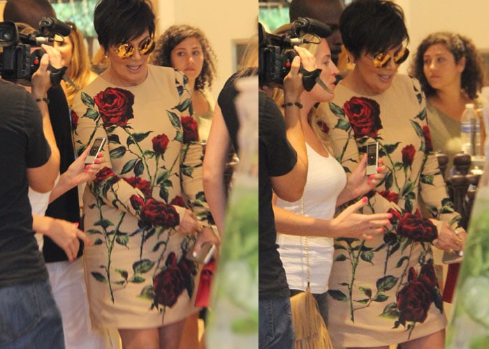 Kris Jenner acknowledges the paparazzi as she attends a book signing in Los Angeles
