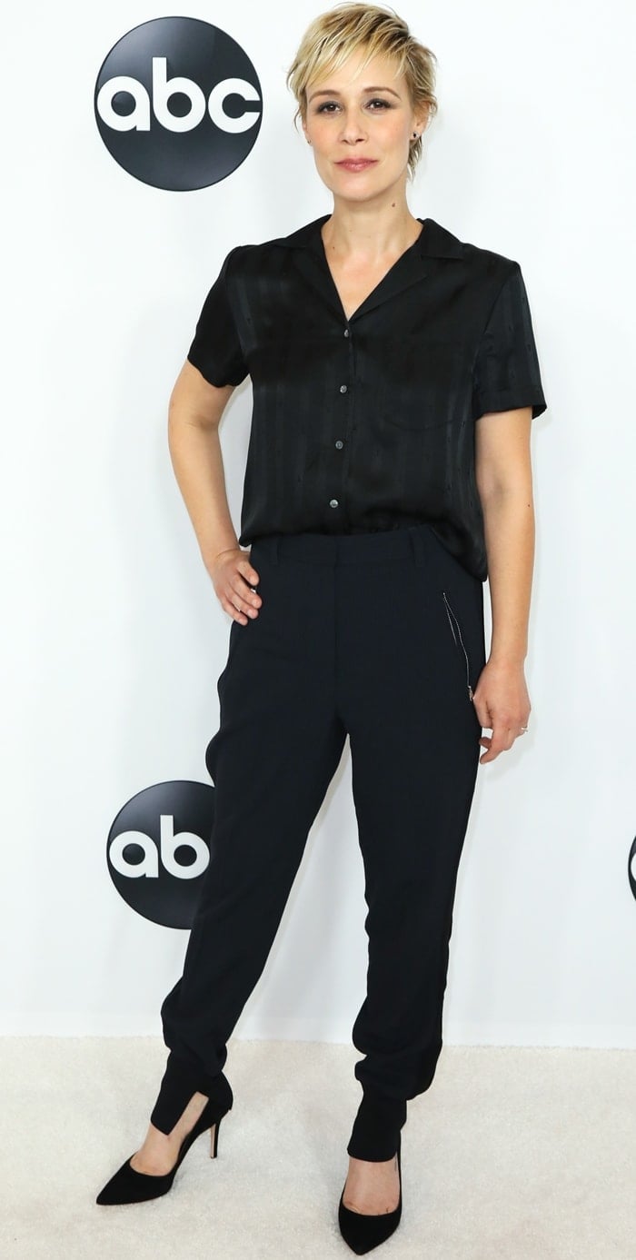 Liza Weil keeps it chic and minimal in an all-black ensemble, pairing tailored pants with sleek pointed-toe heels at the Disney ABC Television TCA Summer Press Tour