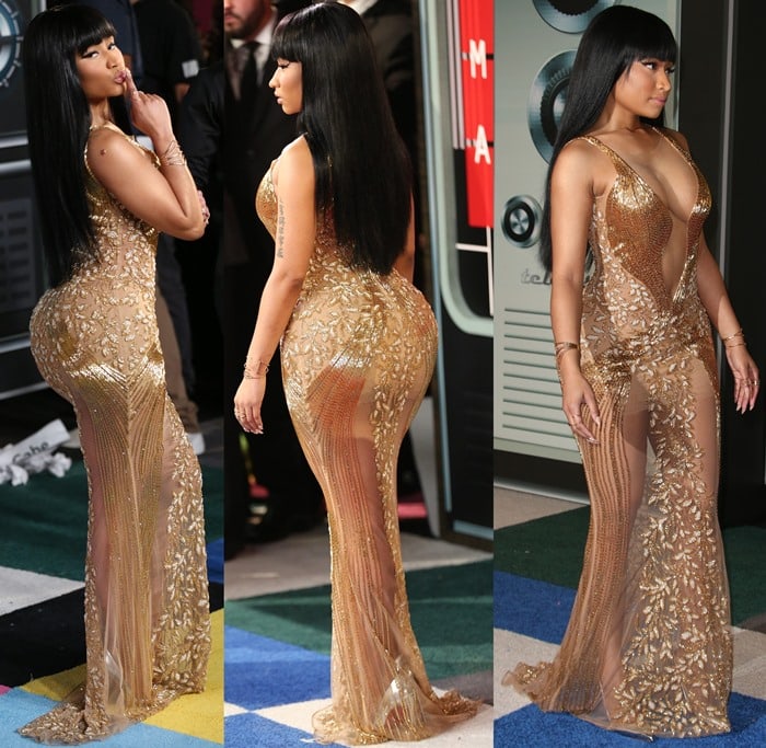 Nicki Minaj struts on the carpet of the MTV VMAs in a stunning gold gown from Labourjoisie