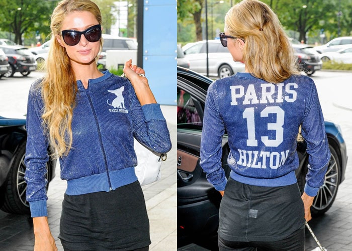 Paris flaunts the front and back of her custom blue sequined jacket