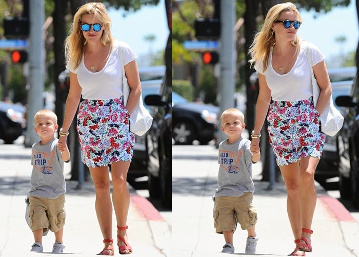 Reese Witherspoon and her son, Tennessee, take a warm day stroll along a sidewalk