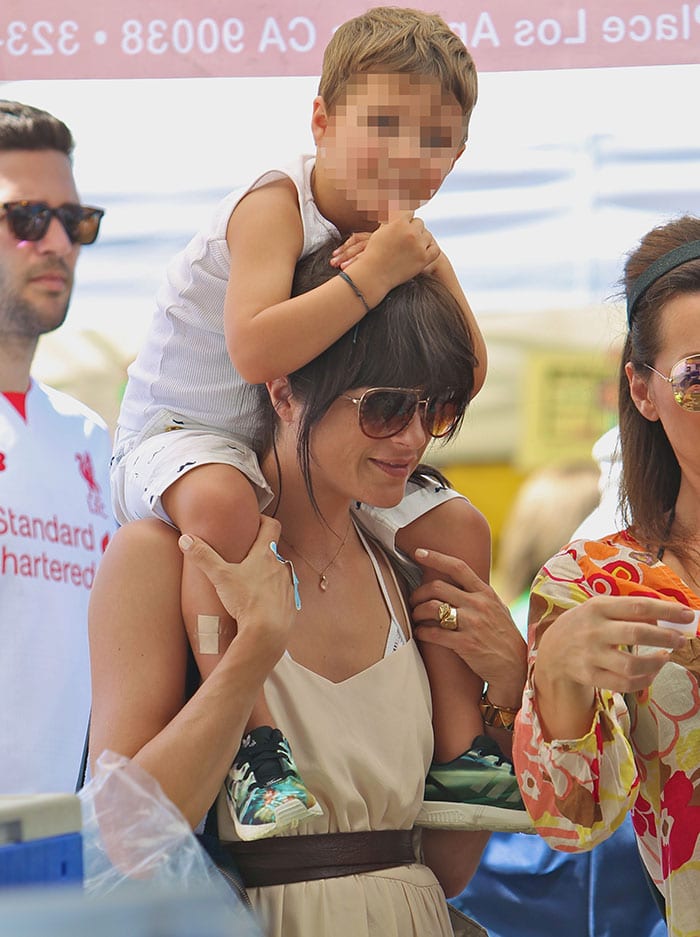 Selma Blair carrying a green Goyard handbag at the Famers Market