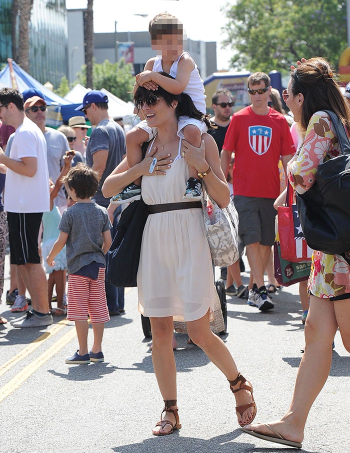 Selma Blair carrying a green Goyard handbag at the Famers Market