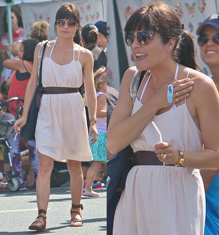 Selma Blair looks comfortable and casual in a lightweight dress and a pair of Sarah Flint sandals