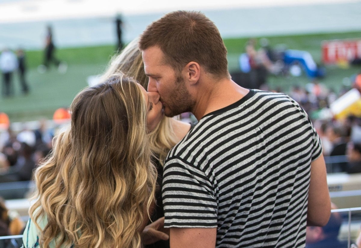 Gisele Bündchen and Tom Brady kissing during the 2014 FIFA World Cup final