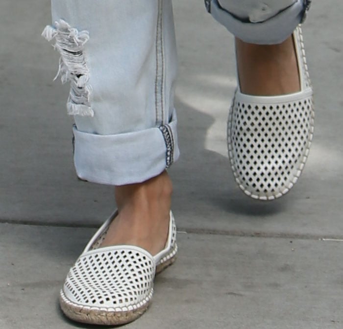 Vanessa Hudgens shows off the laser-cut detailing on her Dolce Vita shoes