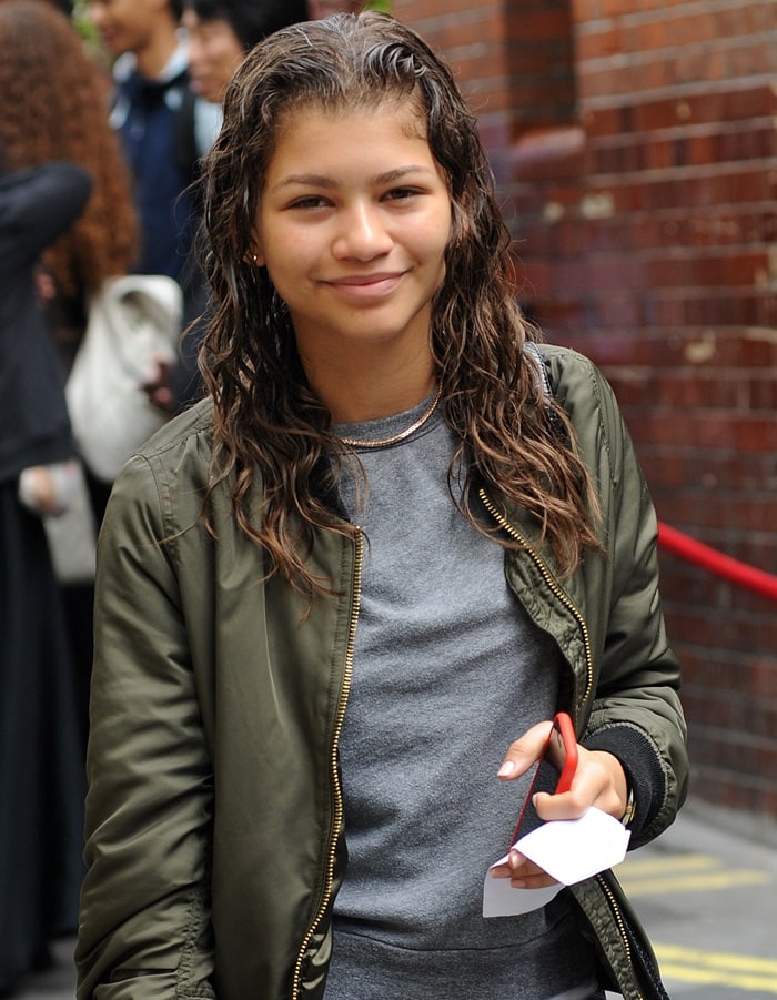 Zendaya lets her still-wet hair hang freely around her shoulders as she leaves her London, UK hotel on August 12, 2015