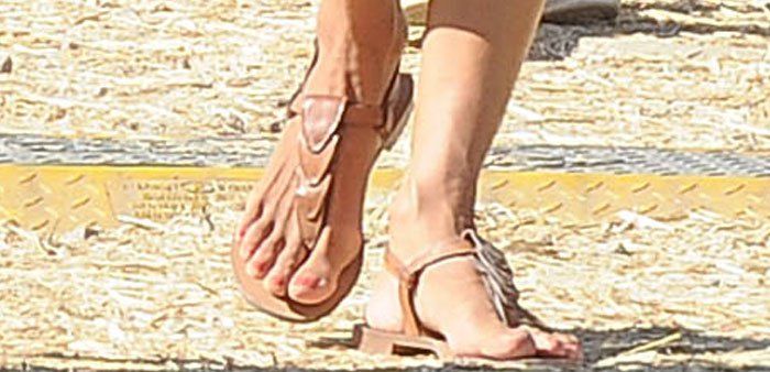Alessandra Ambrosio struts around the Malibu Fair in a pair of sensible Sarah Flint sandals