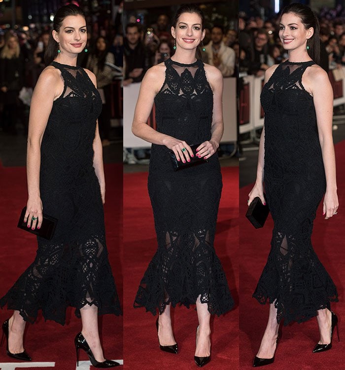 Anne Hathaway is all smiles as she struts the red carpet in a pair of Christian Louboutin pumps