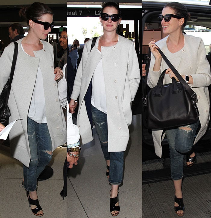 Anne Hathaway wears a white tee, a coat and ripped jeans at LAX