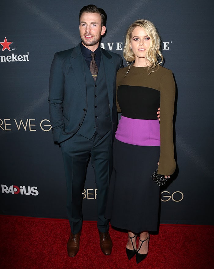 Chris Evans and Alice Eve pose on the red carpet at the "Before We Go" premiere