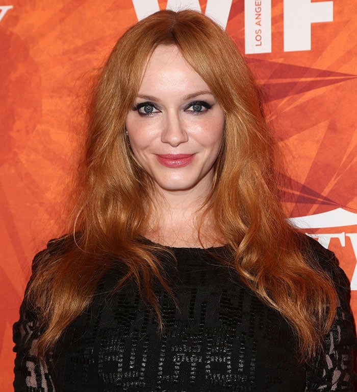 Christina Hendricks with loose wavy hair attends The Television Industry Advocacy Awards Gala