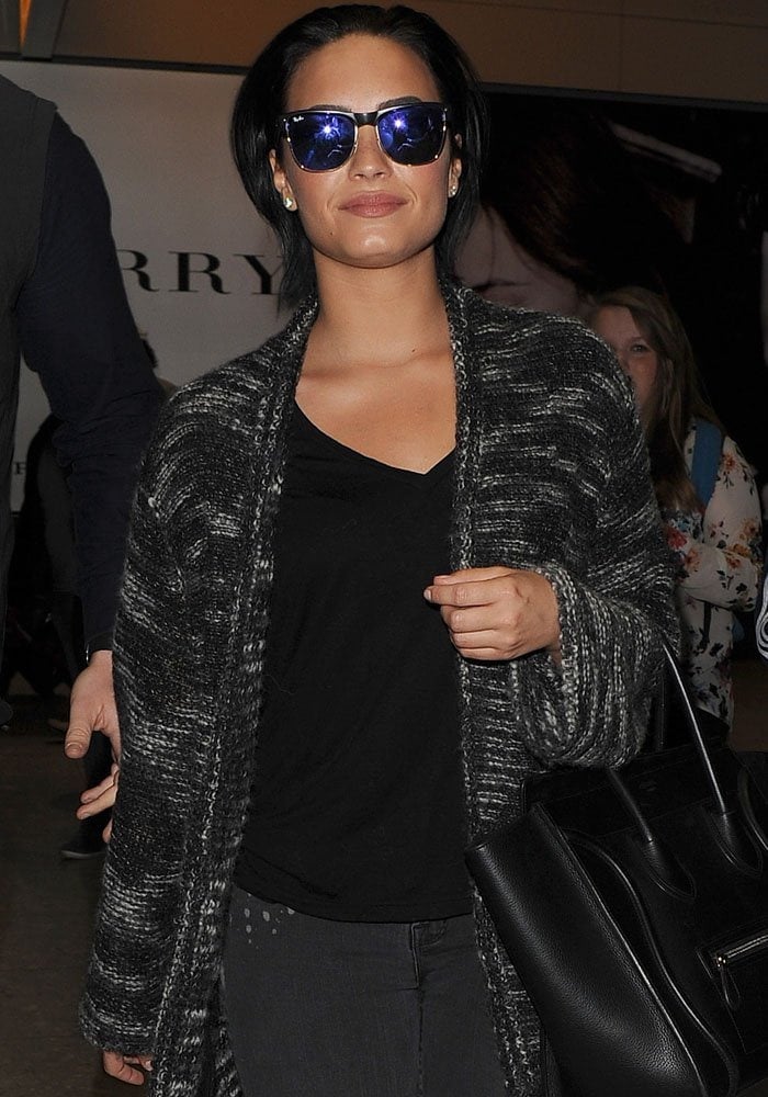 Demi Lovato arrives at London's Heathrow Airport