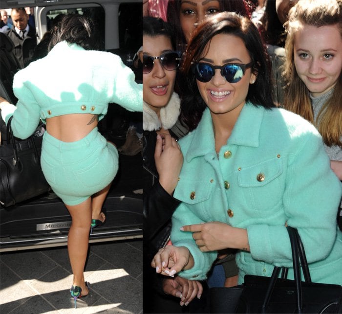 On September 10, 2015, at Kiss FM, Demi Lovato stylishly donned a Moschino Pre-Fall 2015 ensemble, complemented by Christian Louboutin Iriza pumps, Woodys Barcelona Hiroto sunglasses, and a Celine Boston bag