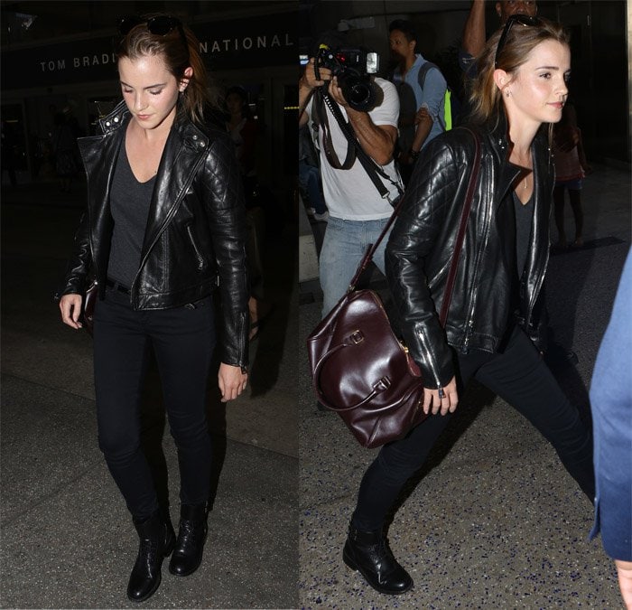 Emma Watson in a black leather jacket, AG Sateen leggings, and Saint Laurent Patti boots
