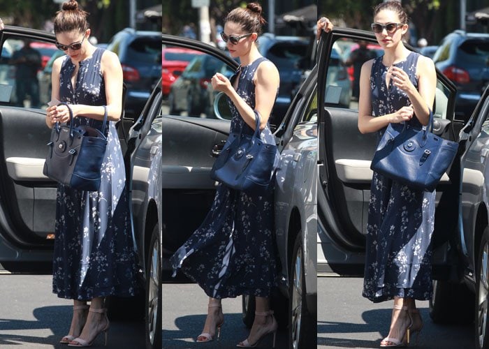 Emmy Rossum steps out of a car as she concludes a spa visit in Beverly Hills