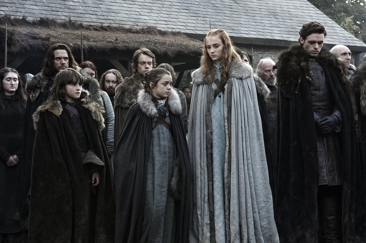 Sophie Turner as Sansa Stark, Maisie Williams as Arya Stark, Isaac Hempstead-Wright as Bran Stark, Richard Madden as Robb Stark, Alfie Allen as Theon Greyjoy, Jamie Sives as Jory Cassel, and Donald Sumpter as Maester Luwin in "Winter Is Coming," the series premiere of the HBO medieval fantasy television series Game of Thrones that aired on April 17, 2011