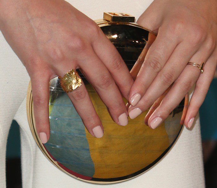 Hailee Steinfeld toted a Jill Milan clutch