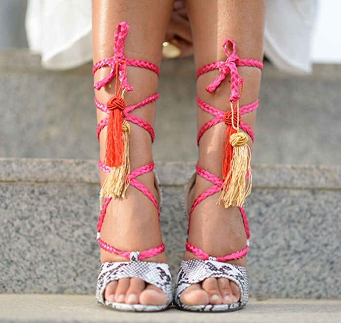 Helena's bright pink braided lace-up straps