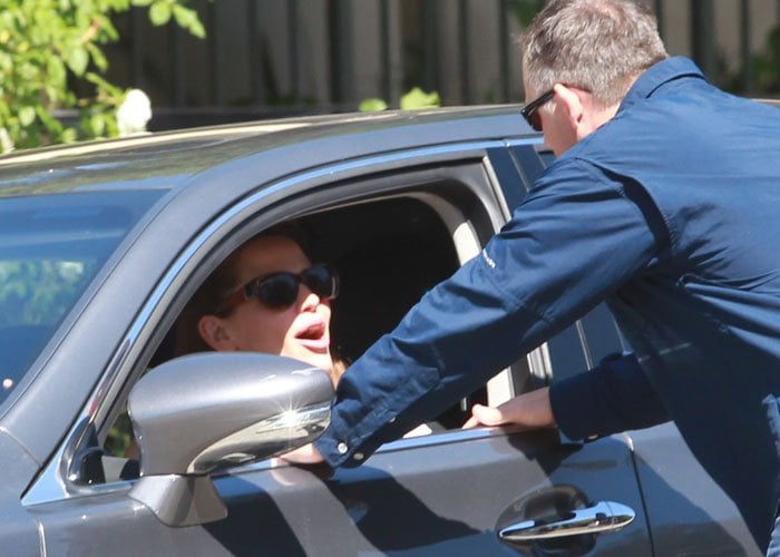 Jennifer Garner returns to her car after taking her children to the church in Pacific Palisades