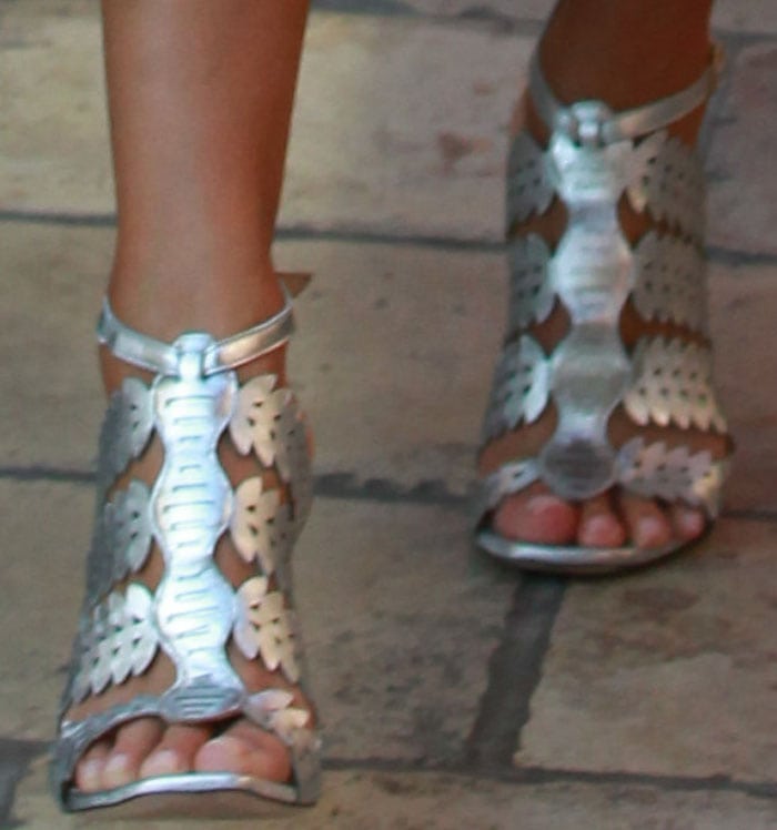 Jessica Alba shows off her feet in a pair of silver sandals from Eight Fifteen