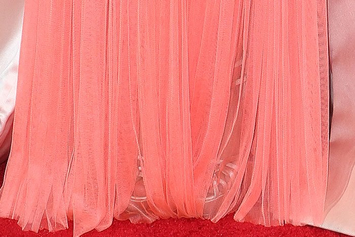 Joanna Newsom's Charlotte Olympia sandals peek out from beneath the tulle of her dress