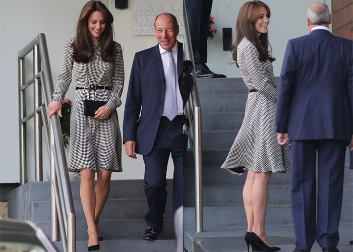 Kate Middleton wears a houndstooth dress from Ralph Lauren during a visit to the Anna Freund Centre