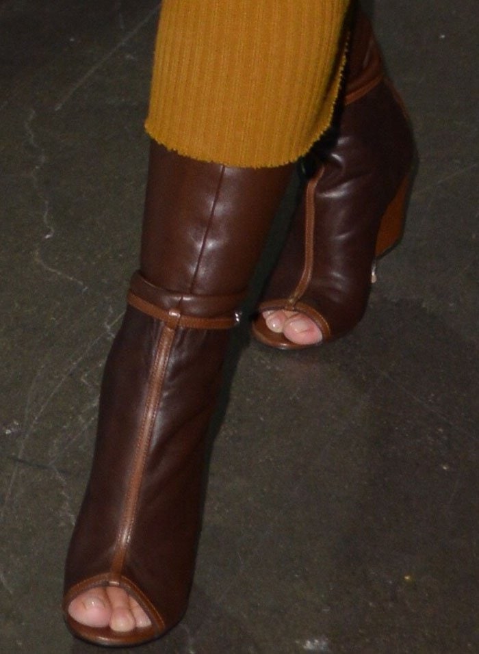 Kim Kardashian's toes peeking out of a pair of Givenchy leather boots