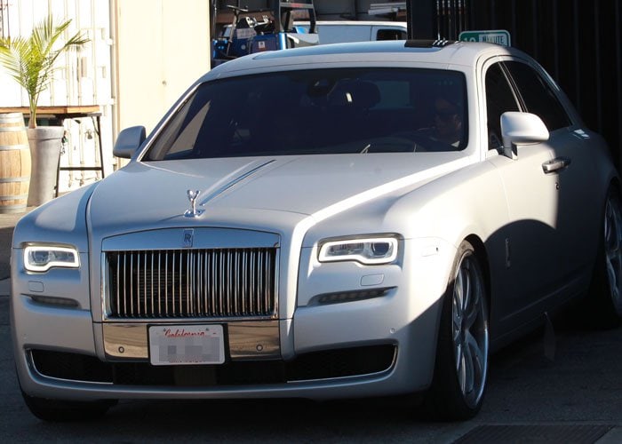 Kim Kardashian's Rolls Royce waits for Kim and Kanye