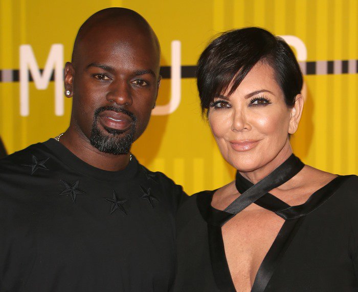 Kris Jenner poses with her boyfriend, Corey Gamble, at the MTV VMAs