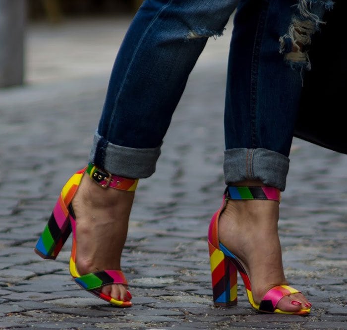 Kristina's hot feet in striking rainbow sandals